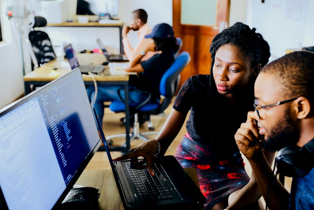 mentor helping student with code
